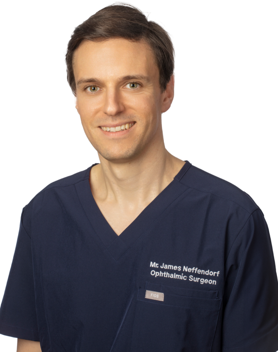 Mr James E. Neffendorf, Ophthalmic Surgeon, wearing a navy blue medical uniform and smiling.